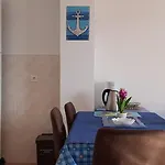 Rb *